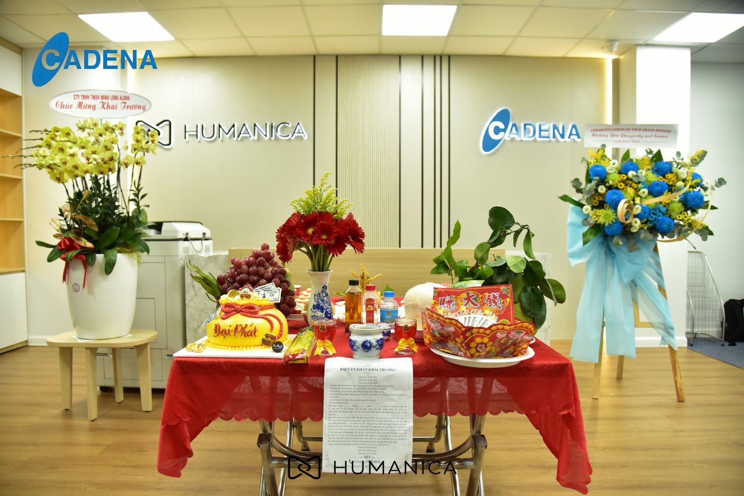 Reception area of Cadena's new floor with congratulatory flowers